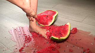 Busty MILF Presents Her Feet and Plays with a Watermelon