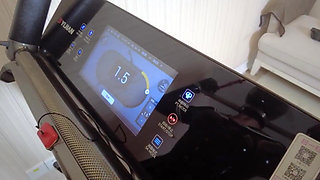 Mz24 - a Girl Bound to a Treadmill with Metal Restraints and Shackles