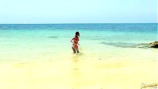 Rio Fujisaki Lovely Asian teen 18+ gives a hot blowjob on the beach