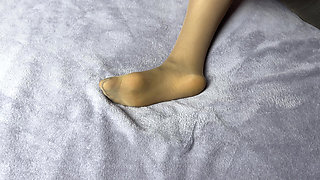 Secretary in Nylon Pantyhose Loves Her Long Legs