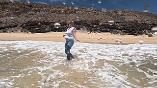 Girl Wetting Jeans in the Ocean and Swimming in Wet White T-shirt
