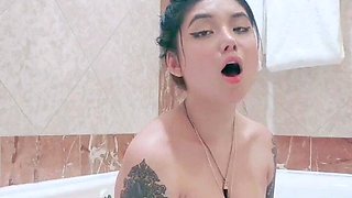 Busty babe playing with her big boobs