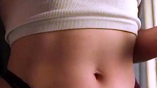 Brunette seductress working her big boobs and hot ass