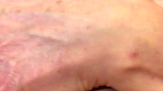 Horny Old Granny Fingers Her Mature Pussy on the Couch