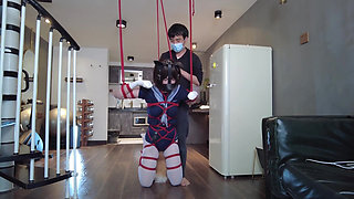 Mz31 - a Girl Tied and Suspended by a Red Rope Reaches Orgasm.