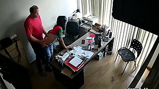Slutty secretary sucks cock and gets fucked on hidden camera