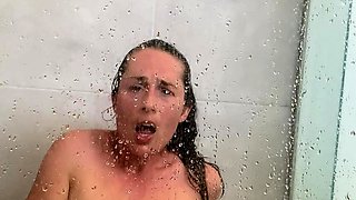 Busty curly brunette with big boobs fucks on couch
