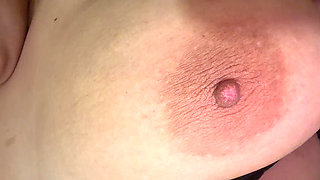 Hot mom massages her tits with a delicious cream